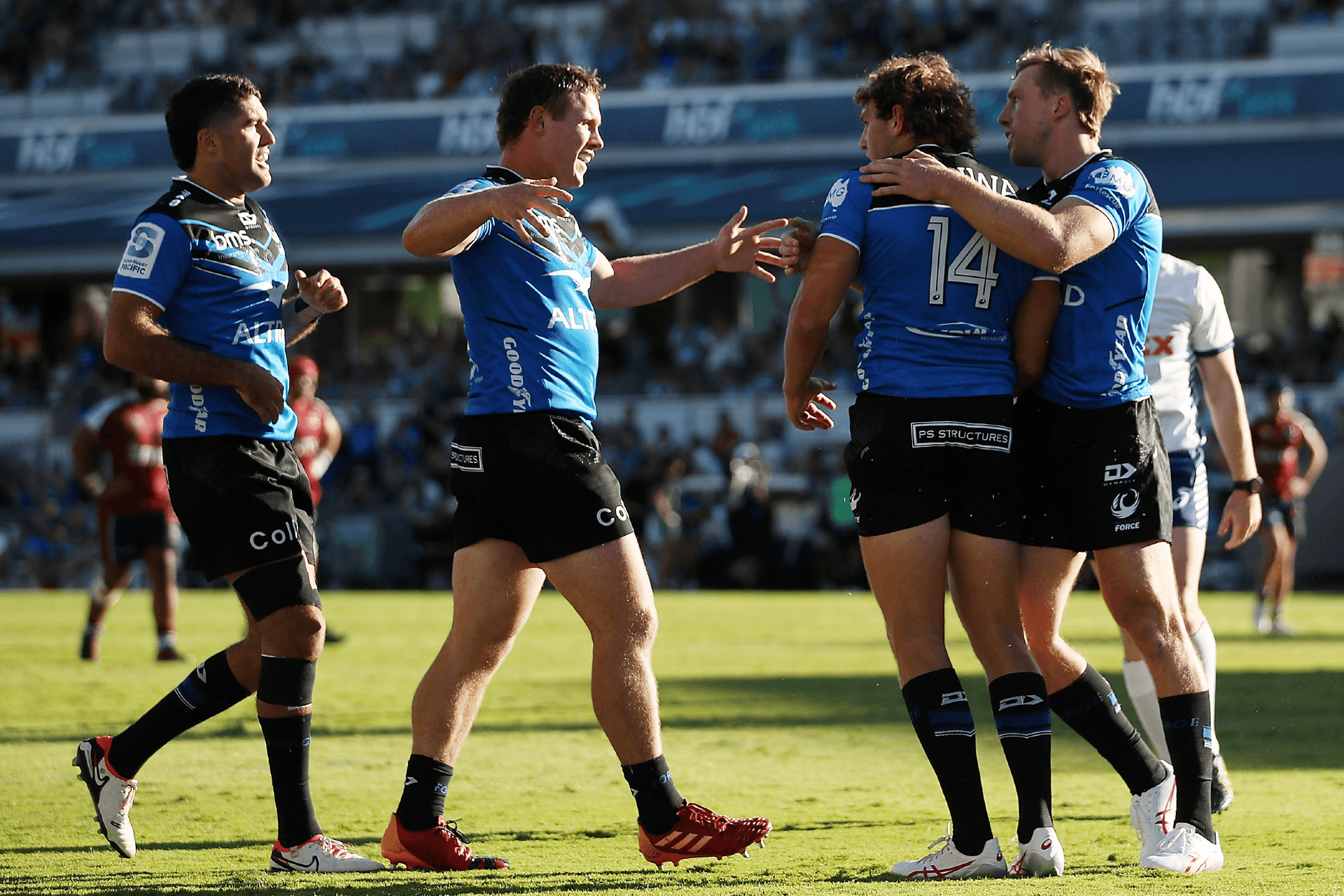 Ben Donaldson, Tom Horton, Bayley Kuenzle and Harry Potter celebrate a Force try. Photo credit: Gary Day