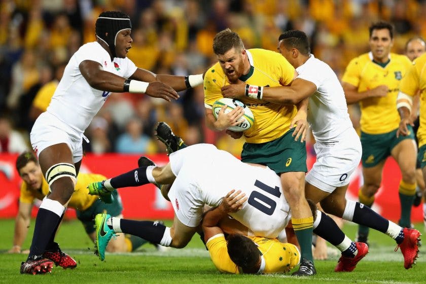 <p>BRISBANE, AUSTRALIA &#8211; JUNE 11: Greg Holmes of the Wallabies is tackled during the International Test match between the Australian Wallabies and England at Suncorp Stadium on June 11, 2016 in Brisbane, Australia.  (Photo by Cameron Spencer/Getty Images)</p>
